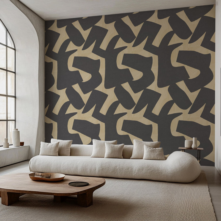 Intarsia charcoal and sand textured wallpaper accent wall in a designer room setting