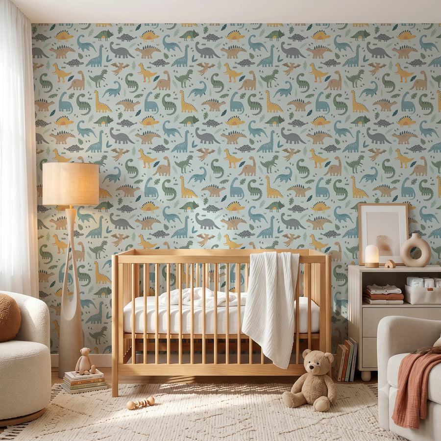 Cute light blue dinosaur wallpaper in a nursery with a wooden crib, armchair and floor lamp