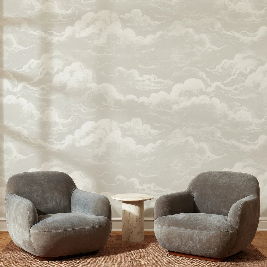 Light grey sky and clouds wall mural in a sitting room with boucle chairs