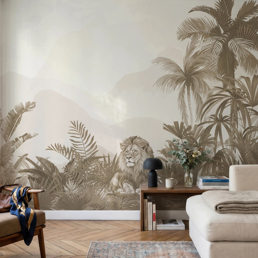 Sepia lion tropical jungle wall mural in a living room behind a cream sofa and desk