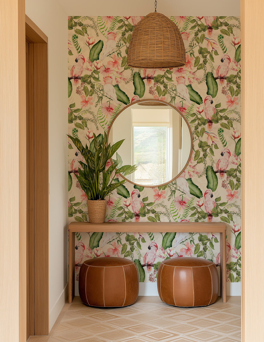 Pink cockatoo exotic tropical wallpaper in an entryway with a console table