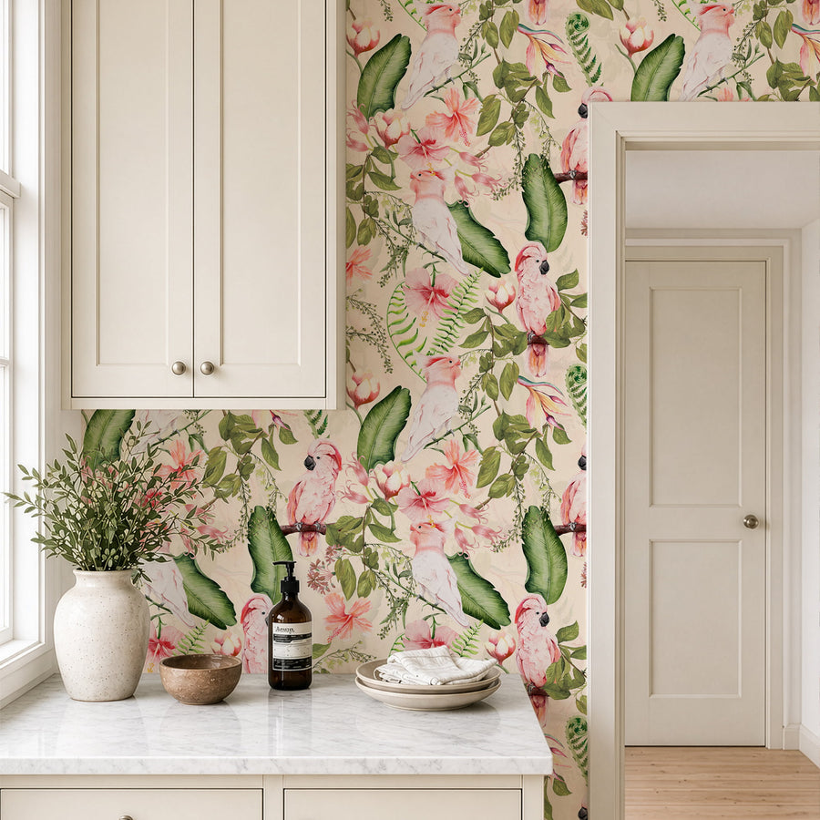 Pink cockatoo exotic tropical wallpaper in a kitchen with marble counter