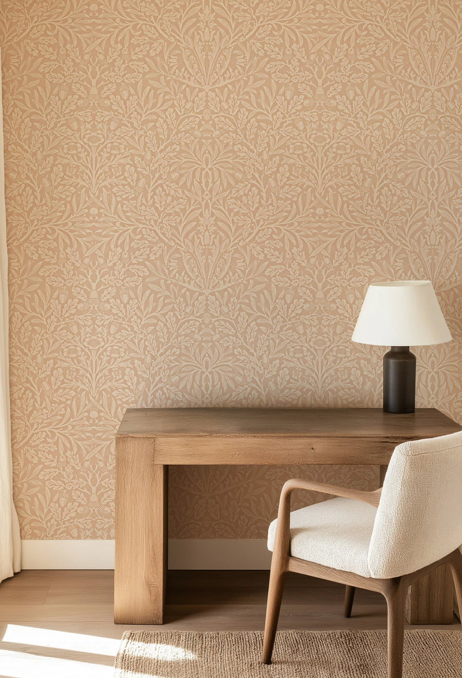 William Morris Acorn terracotta wallpaper in a study behind a wood desk