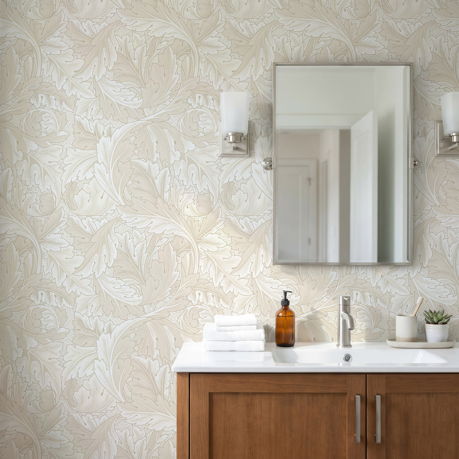 Beige Acanthus William Morris wallpaper in a bathroom with vanity and mirror
