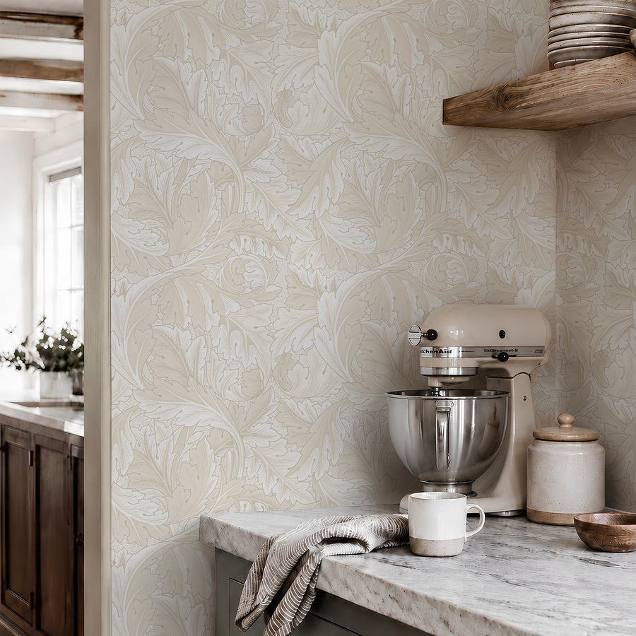 Beige Acanthus William Morris wallpaper in a kitchen with marble counter and wood shelves