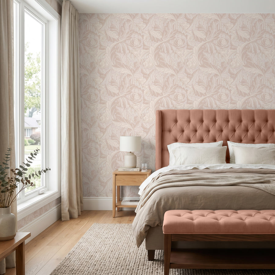 Blush pink Acanthus William Morris wallpaper in a bedroom with a pink tufted headboard