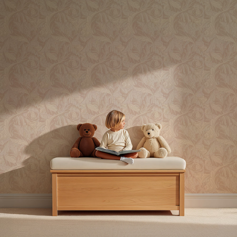 Blush pink Acanthus William Morris wallpaper in a nursery with a child on a bench