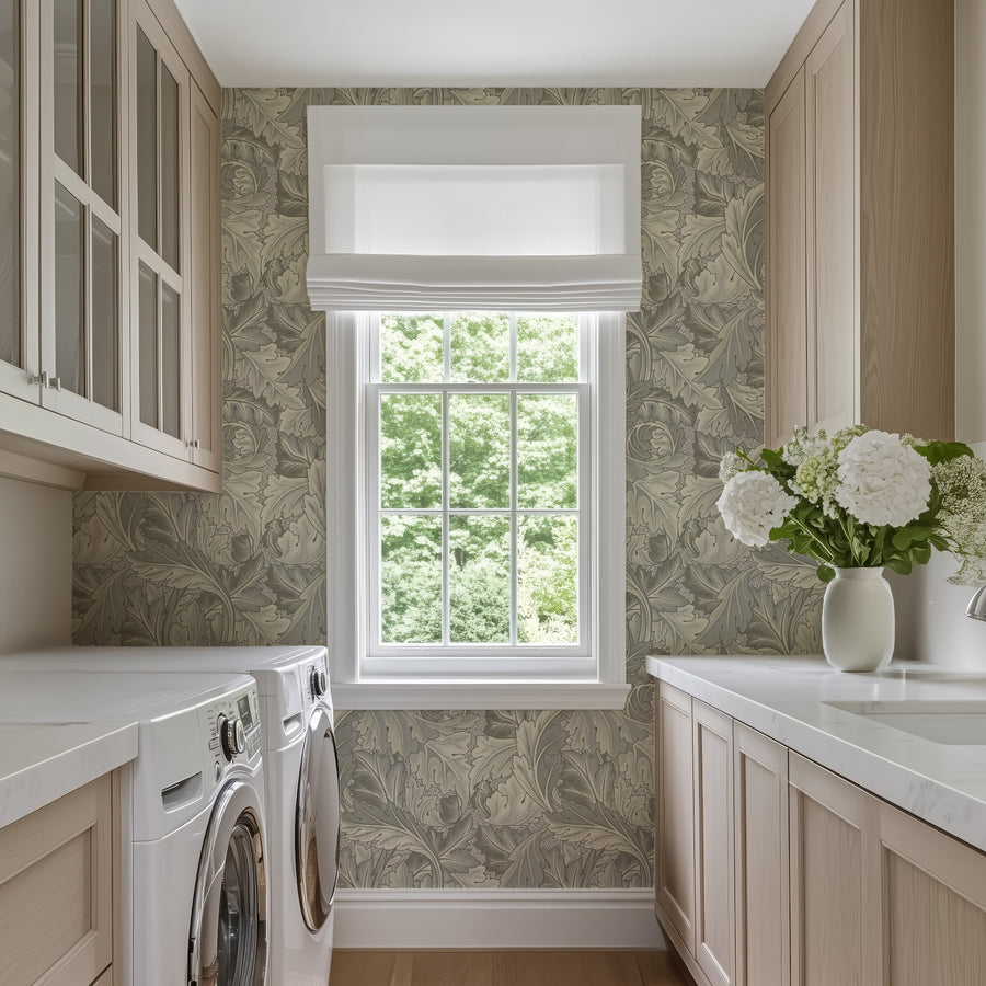 Gray Acanthus William Morris wallpaper in a laundry room above cabinets