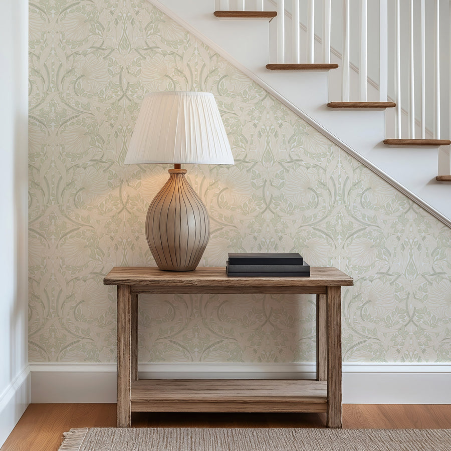 William Morris Pimpernel wallpaper in beige and sage green on a stair landing