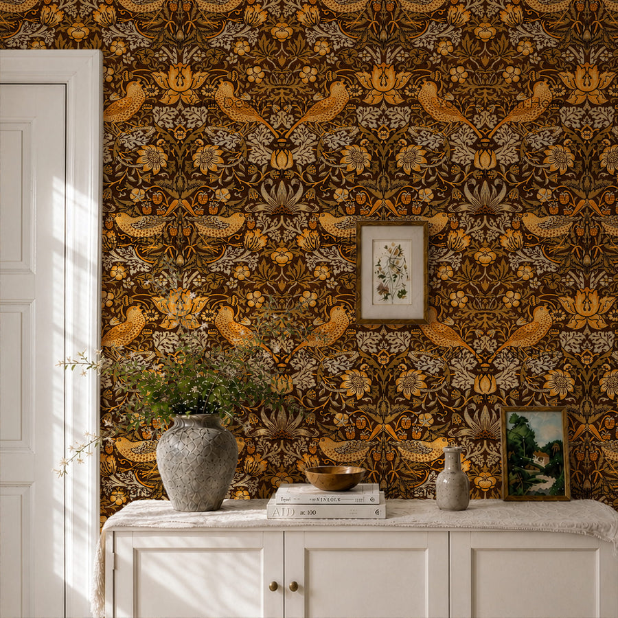 William Morris Strawberry Thief brown wallpaper in an entryway behind a marble-top console