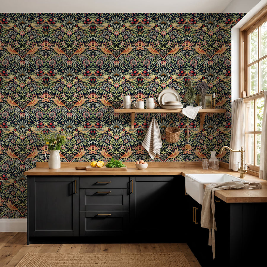 William Morris Strawberry Thief indigo wallpaper in a kitchen with dark cabinets